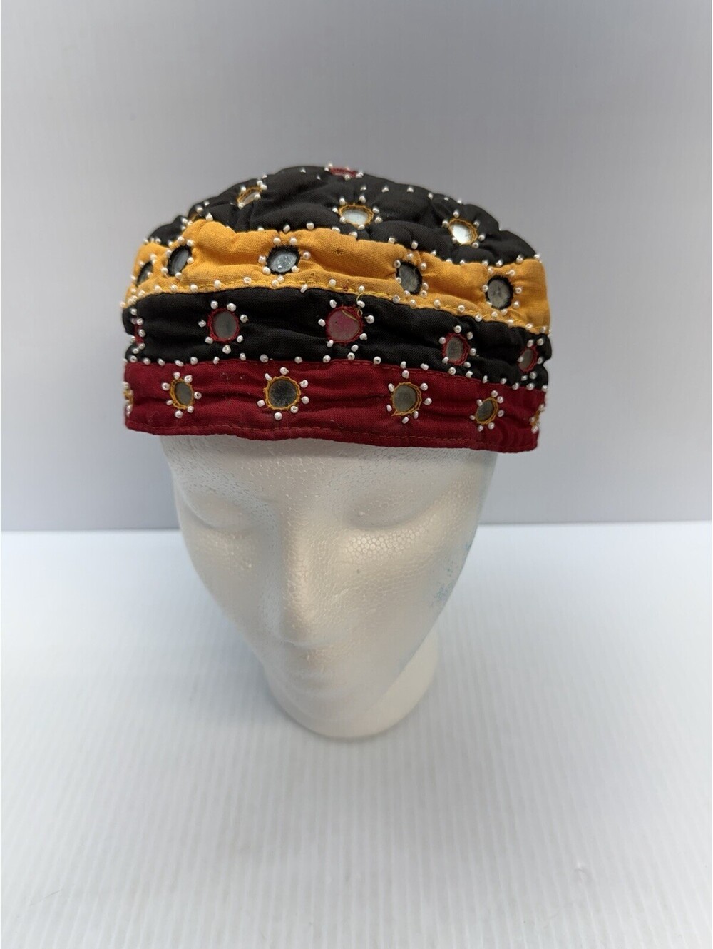 Traditional Handcrafted Cap Adorned With Colorful Fabrics Intricate